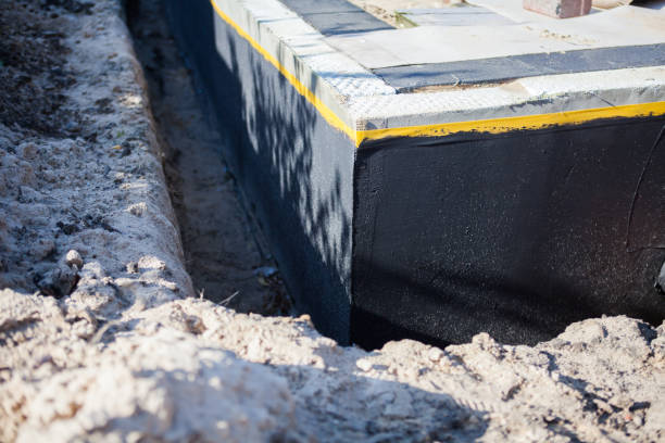Professional Foundation Crack Repair technician working in Madisonville, TN